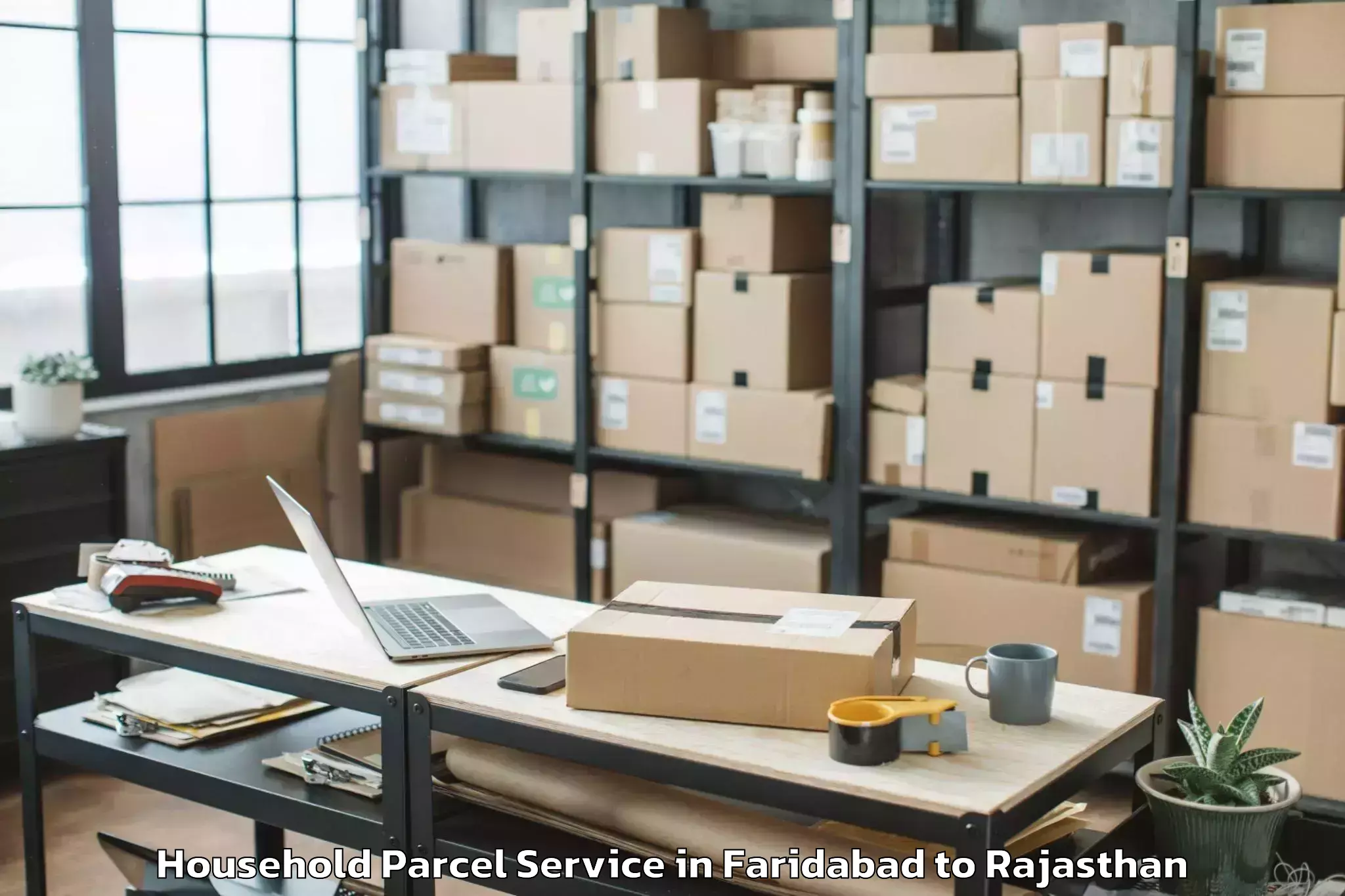 Reliable Faridabad to Jaipur National University Jai Household Parcel